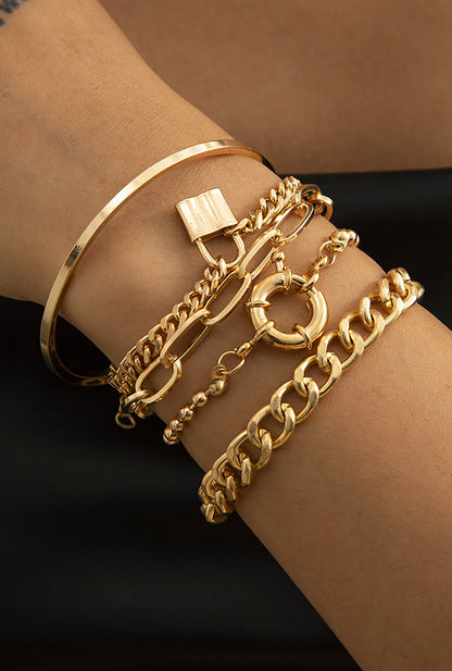 SET OF GOLDEN LAYERED BRACELETS